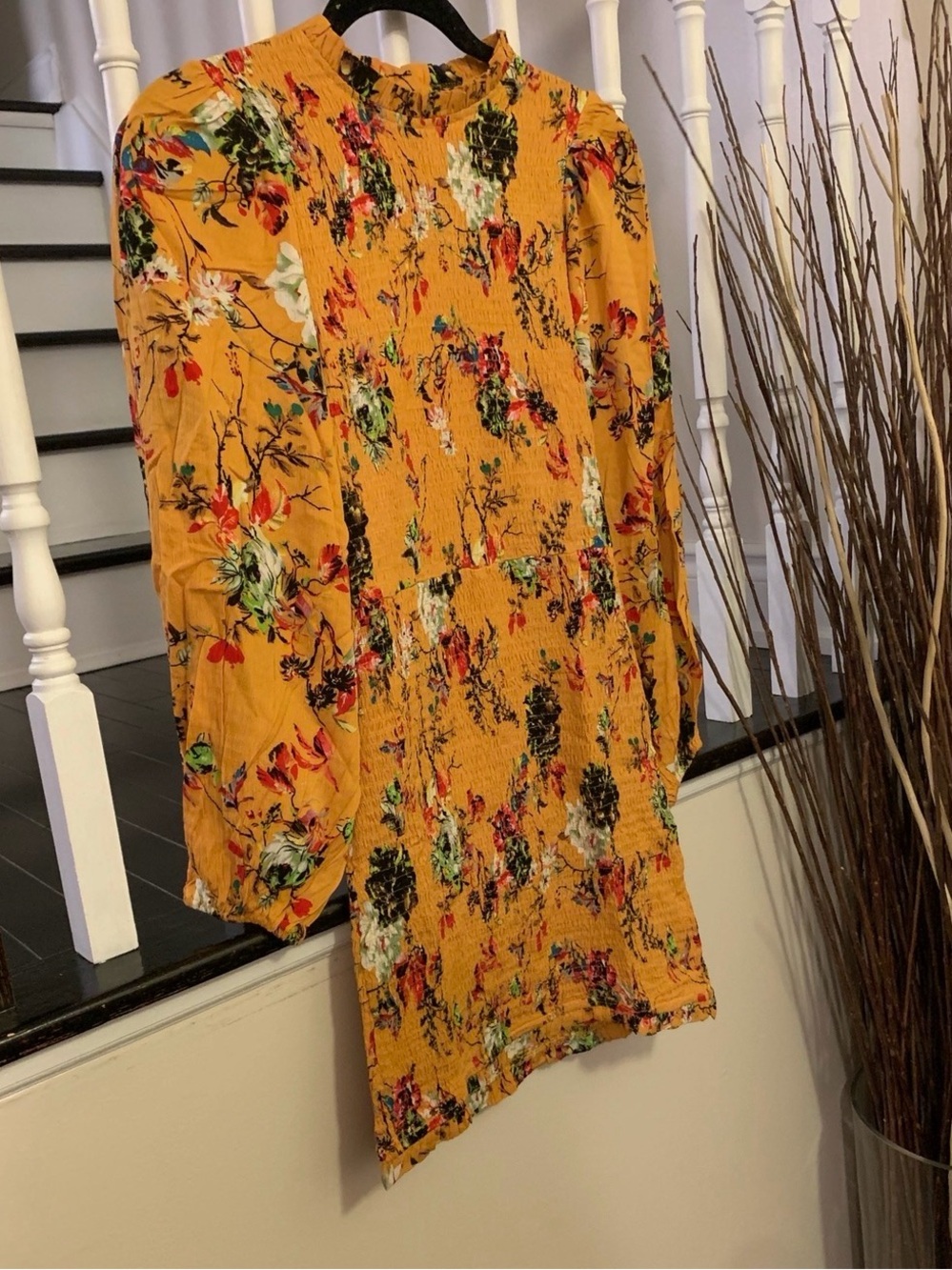 the clothing company Mustard Yellow Floral Long Sleeve Dress